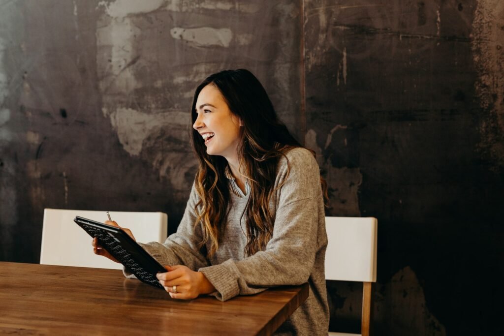 Business owner reviewing reports on a tablet